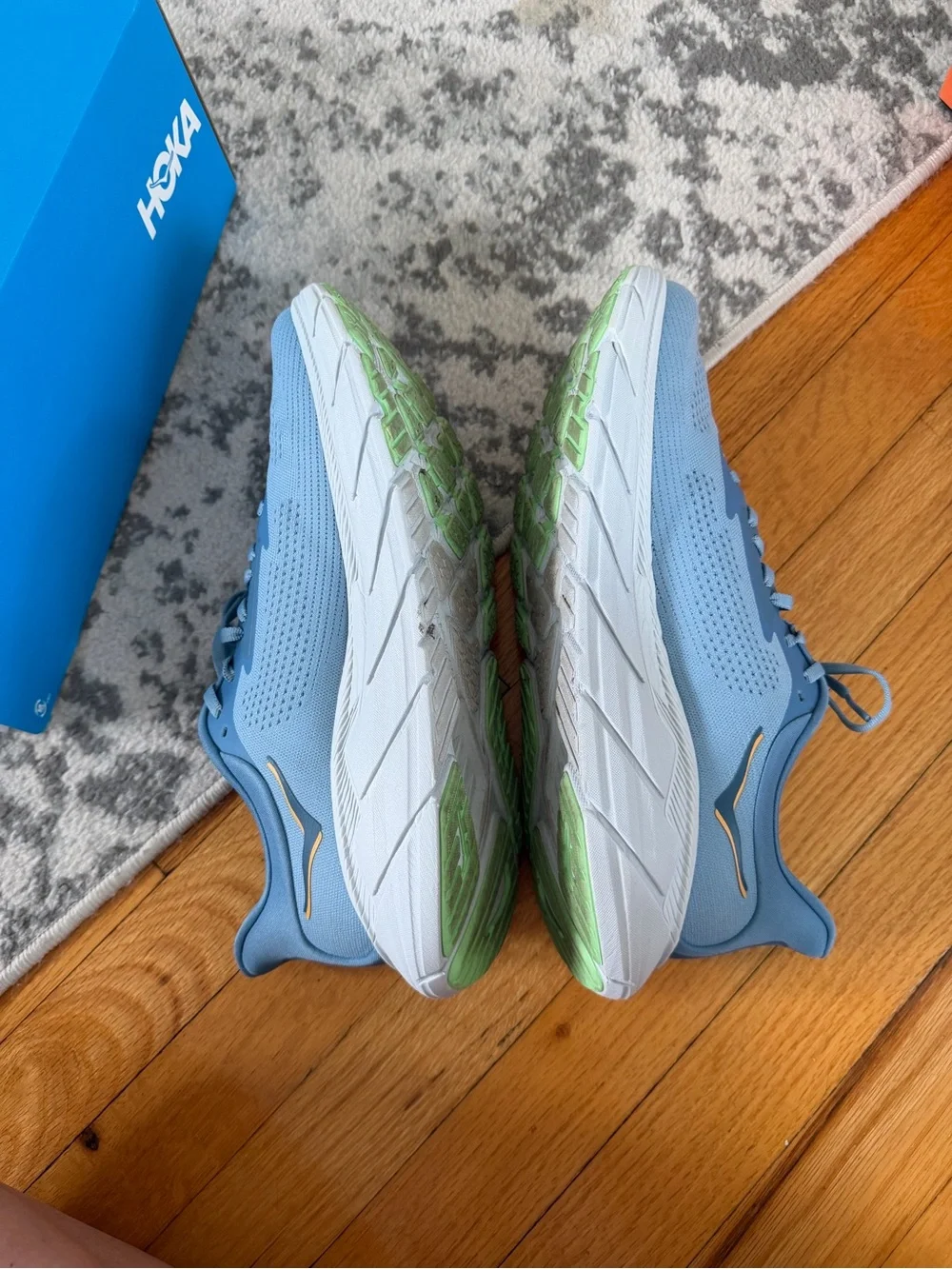 Hoka Men's Athletic Running Shoes in Light Blue with White Soles M ARAHI 7